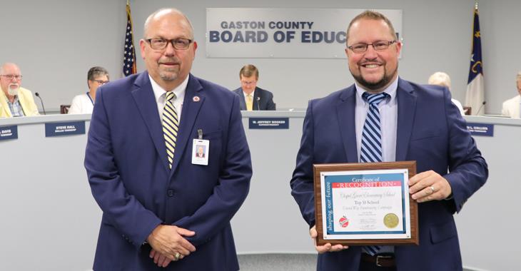 Chapel Grove Elementary principal Mitch Allen pictured with Board Chairman Jeff Ramsey.